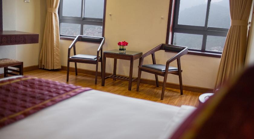 Image of Deluxe Triple - 1 Double Bed and 1 Single Bed 4