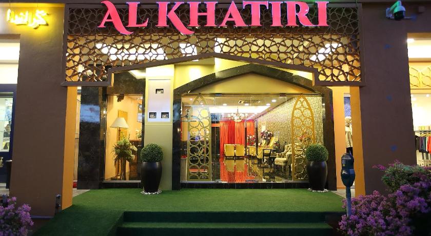 a store front with a sign that says "downtown", Al Khatiri Hotel in Kota Bharu