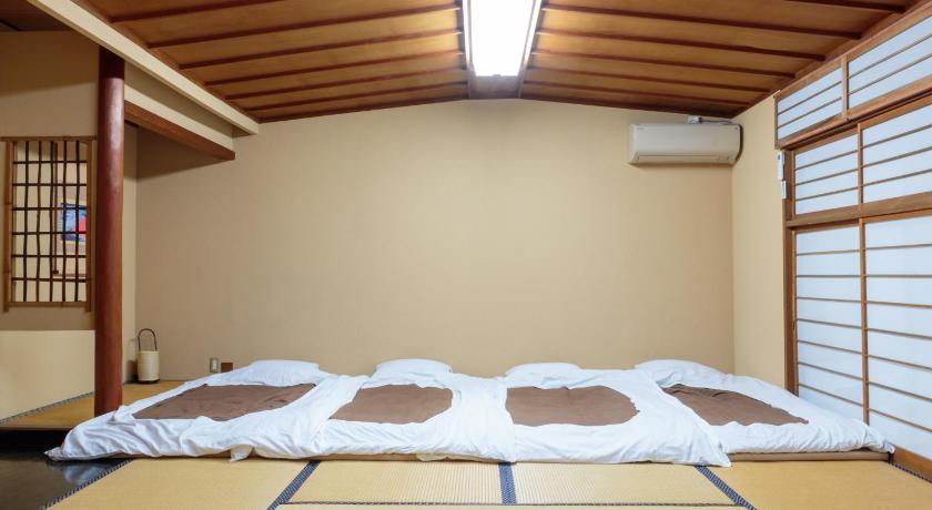 Image of Japanese Style Family Room With Shared Bath 0