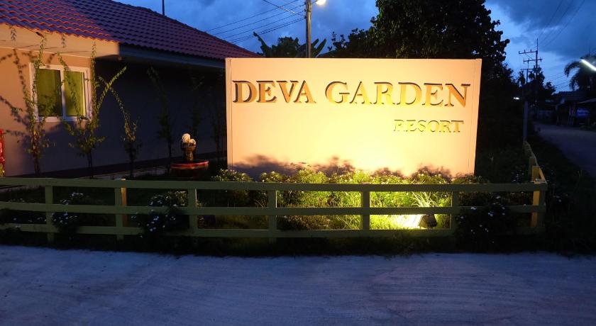 a sign on the side of a building, Deva Garden Resort in Prachinburi