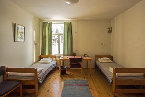 Image of Economy Twin Room with Shared Bathroom 0