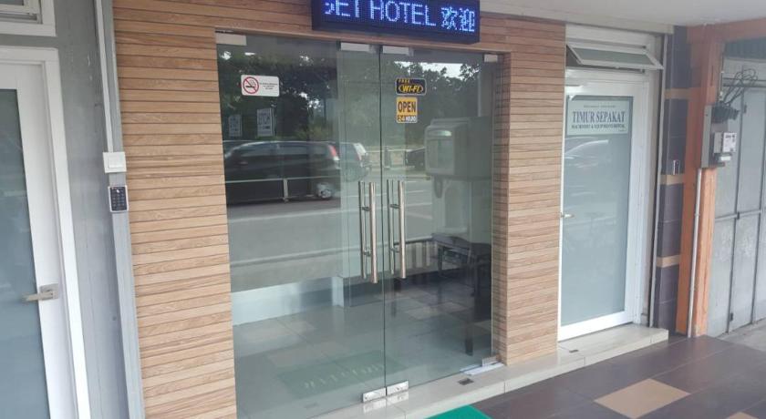 a door of a building with a sliding glass door, Pekan Budget Hotel in Pekan