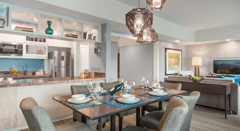 a dining room table and chairs in a kitchen, Ascott Makati in Manila