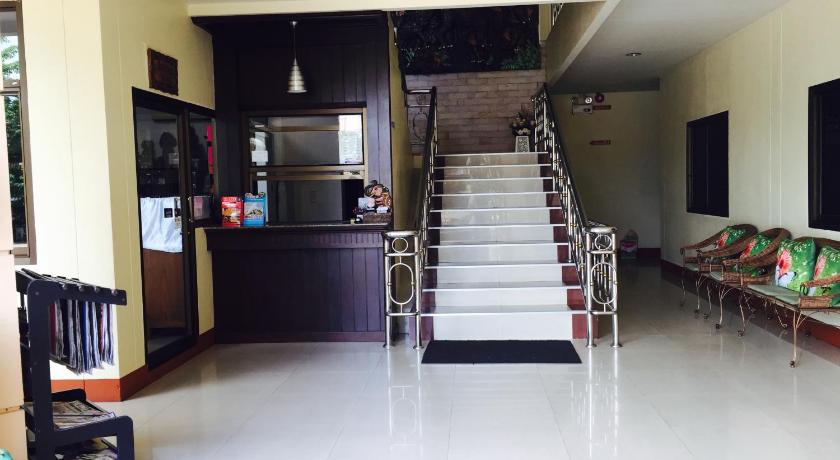 a room with a lot of chairs and a lot of stairs, Panchan Place in Ubon Ratchathani