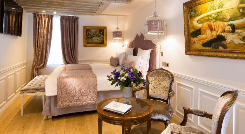 Immagine di Junior Suite con Vasca Idromassaggio (Junior Suite with Jacuzzi) 0