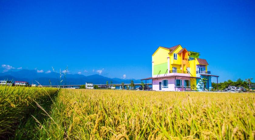 a large white building with a blue sky, Meet a miracle in Yilan
