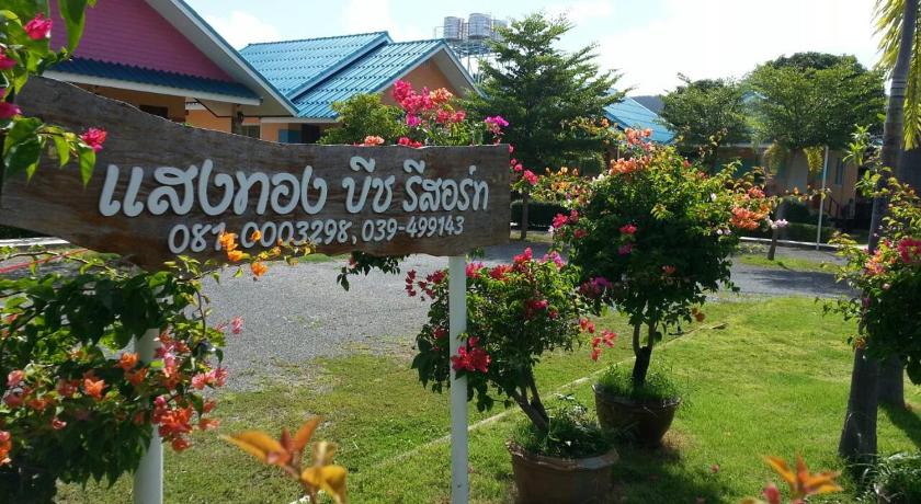 a sign that is on the side of a building, Sangtong Beach Resort in Chanthaburi