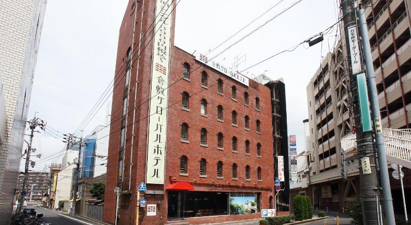 a large building with a large sign on the side of it, Kurashiki Global Hotel in Kurashiki