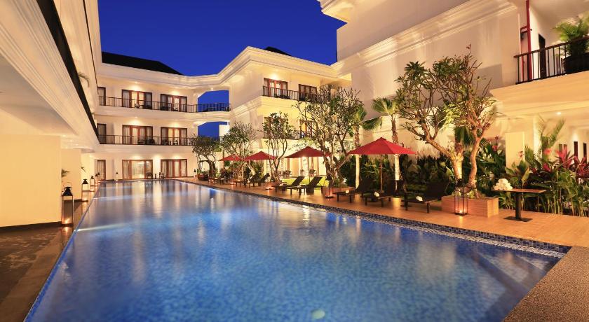 a large swimming pool in a hotel room, Grand Palace Hotel Sanur - Bali in Bali