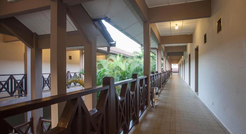 a walkway leading to a building with a balcony, Hotel Seri Malaysia Bagan Lalang - Sepang in Kuala Lumpur