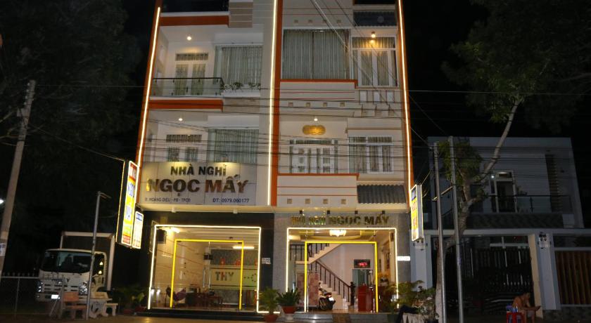 a large white building with a large window, Ngoc May Guesthouse in Chau Doc (An Giang)