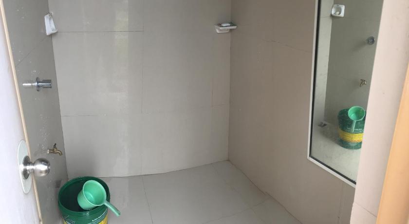 a bathroom with a toilet and a sink, Hiwang Native House Inn & Viewdeck in Banaue