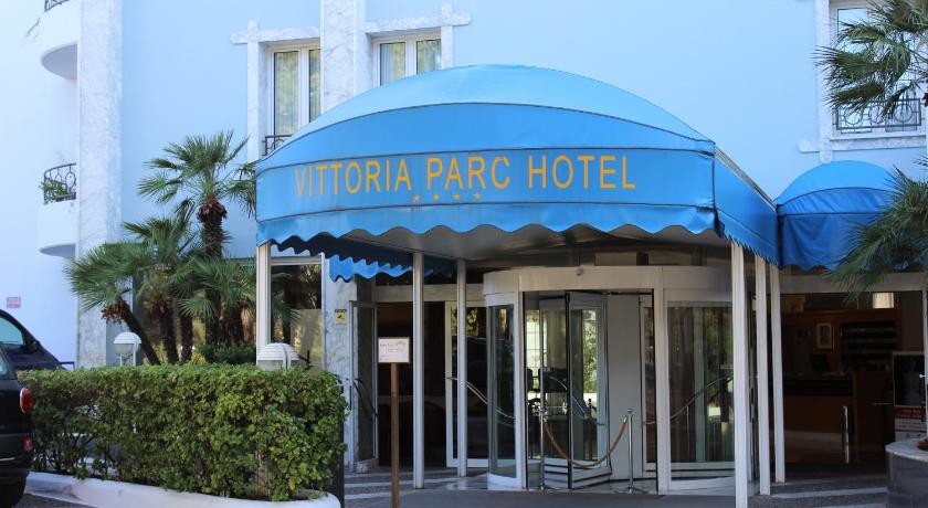 a building that has a fountain in front of it, Vittoria Parc Hotel in Bari