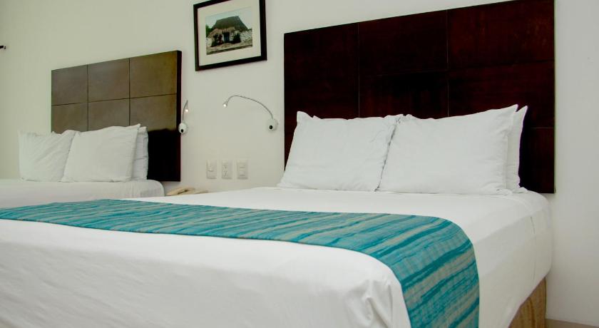 Image of Superior Deluxe Room with Mini Refrigerator and Garden View, 2 double beds 9