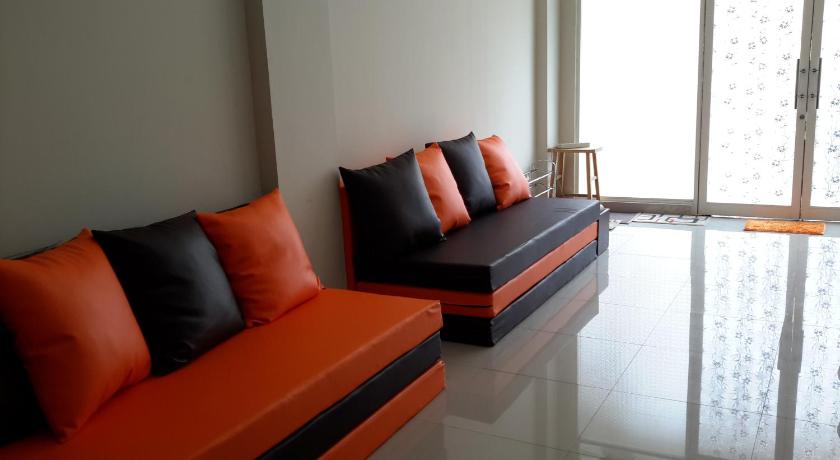 a living room filled with furniture and a window, Grand Galaxy at Kalimalang in Bekasi