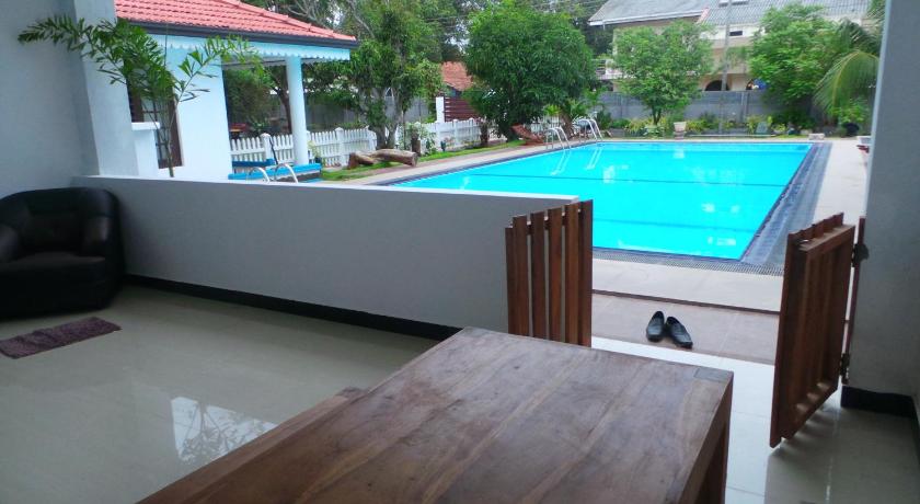 Woodnest Windmill Beach Hotel - image 32