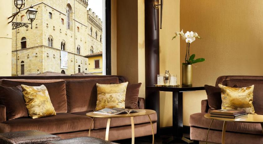 a living room with two couches and a coffee table, San Firenze Suites & Spa in Florence