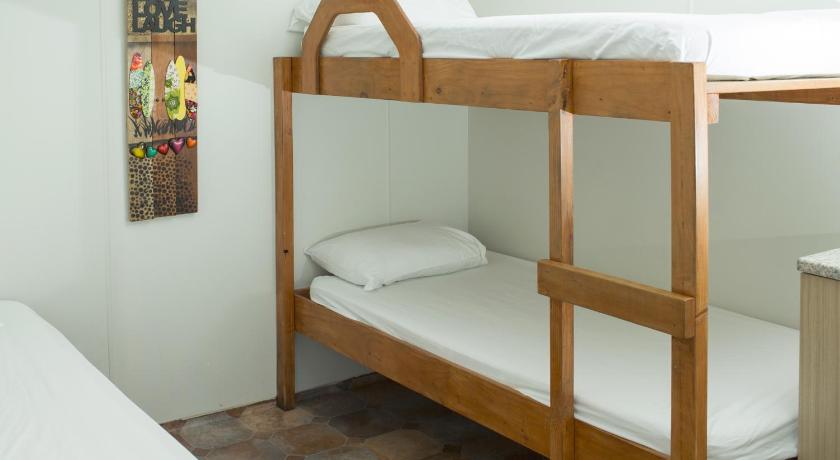 Image of Basic Triple Room with Shared Bathroom 2