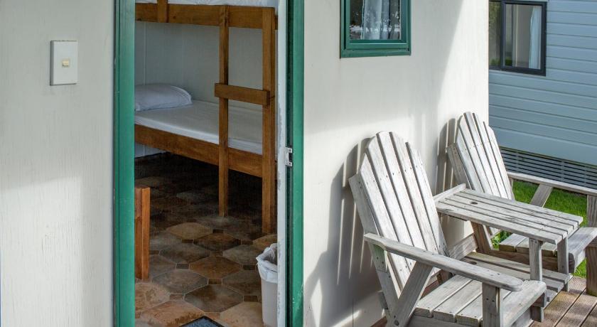 Image of Basic Triple Room with Shared Bathroom 0