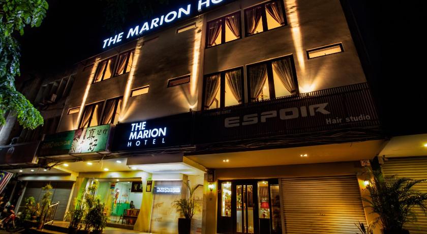a large building with a sign on the side of it, The Marion Hotel in Johor Bahru