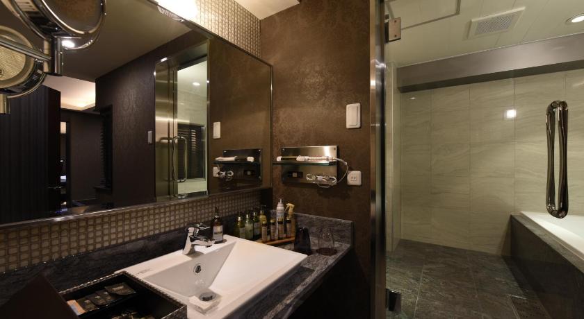 a bathroom with a sink and a large mirror, Hotel Aria(Adult Only) in Chiba