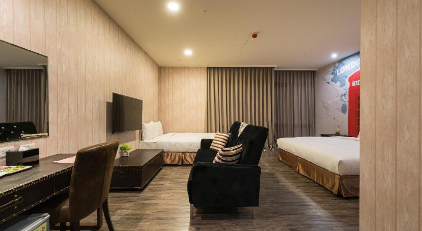 Image of Deluxe Quad Room City View 8