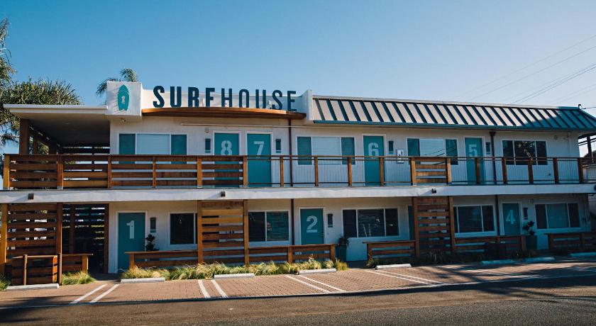 a large building with a lot of windows on the side of it, Surfhouse in Encinitas (CA)