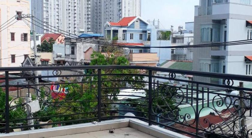a view from a balcony of a city street, Lee Hotel in Ho Chi Minh City