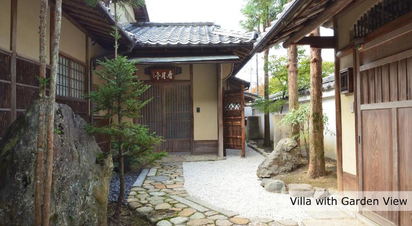 a stone building with a door leading to a tunnel, Aoi Suites at Nanzenji Modern & Traditional Japanese Style in Kyoto
