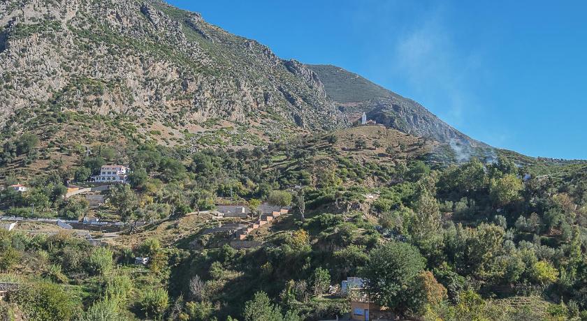a mountain range with trees and mountains, Hostal La Joya in Chefchaouen