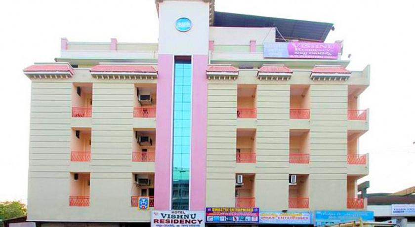 a building with a sign on the side of it, Hotel Vishnu Residency in Visakhapatnam
