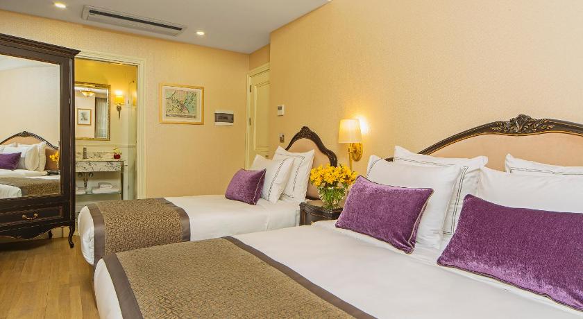 รูปของห้องดีลักซ์สำหรับสามท่าน - อาคารเสริม (Deluxe Triple Room - Annex) 1