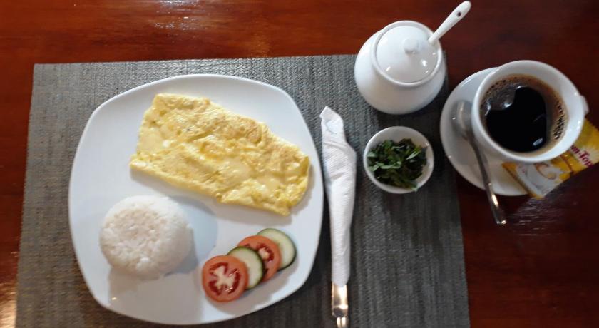 a white plate topped with breakfast food and a cup of coffee, Spaces Hotel Makati - People & Pets in Manila