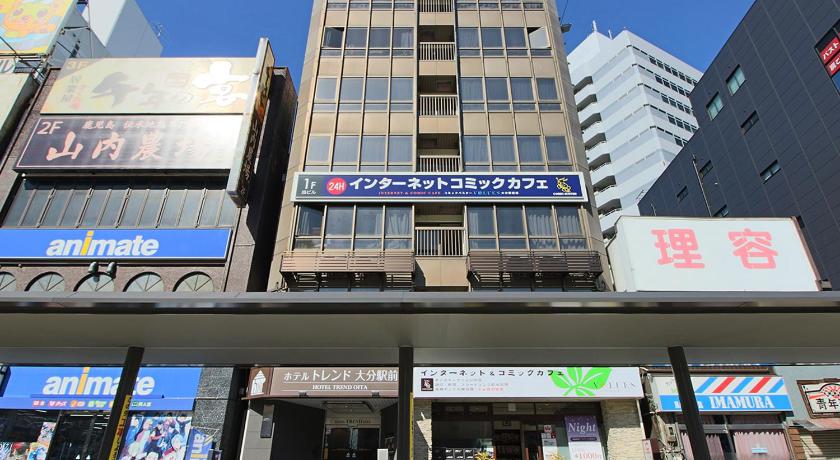 a large building with many signs on it, Hotel Trend Oita Ekimae in Oita