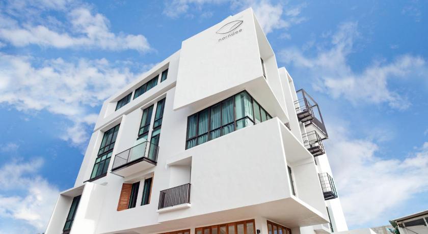 a large white building with a large window, Norndee Hotel Hua Hin in Hua Hin / Cha-am