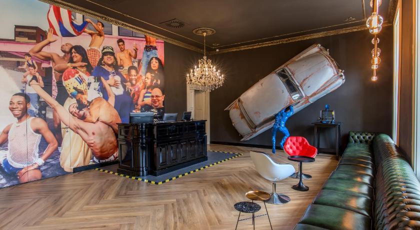 a living room filled with furniture and a painting, meetme23 in Prague