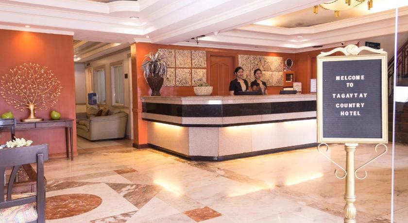 a large kitchen with a large counter top, Tagaytay Country Hotel in Tagaytay