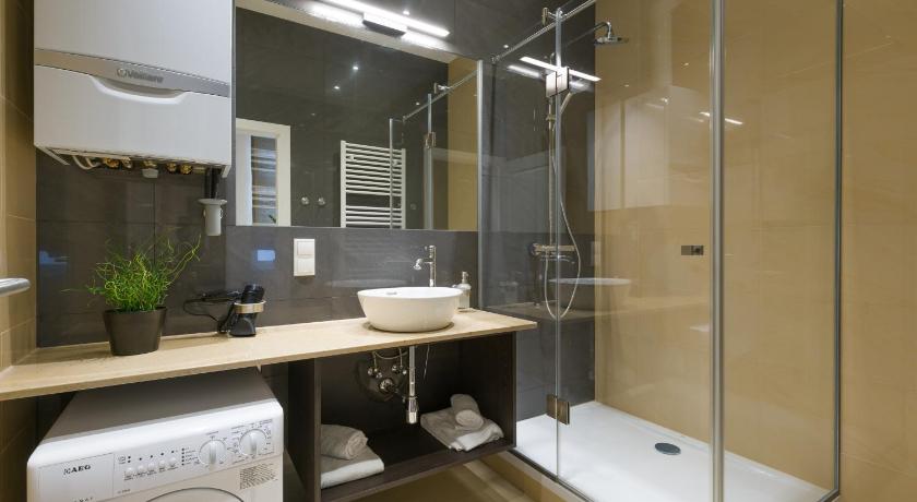 a bathroom with a shower, sink, and tub, Vienna Stay Apartments Pezzl 1170 in Vienna