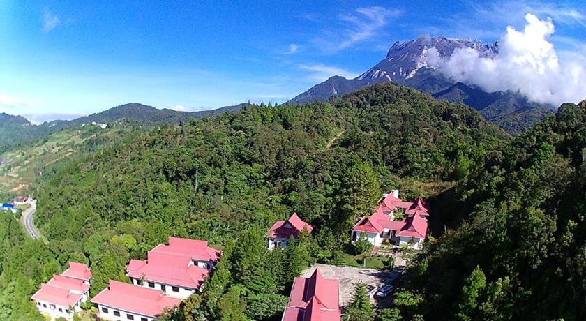 a scenic view of a village with a mountain range, Skyville Zen Resort in Kinabalu National Park