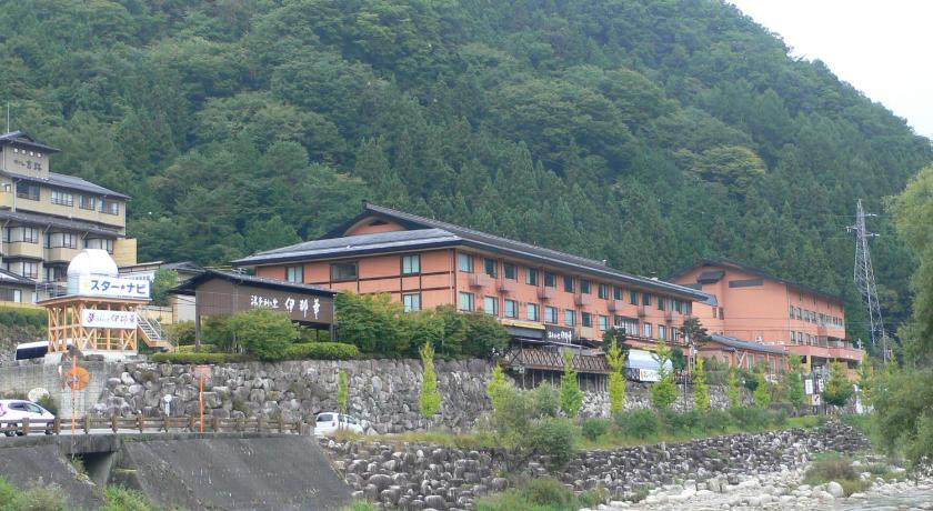 a large building on a hill near a river, Yuttarino-Sato Inaka in Iida
