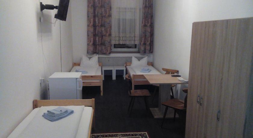 Image of Triple Room with Shared Toilet 0
