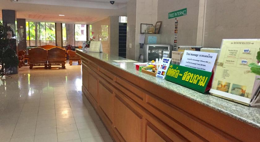 a large kitchen with a large counter top, Sport Inn in Chiang Rai
