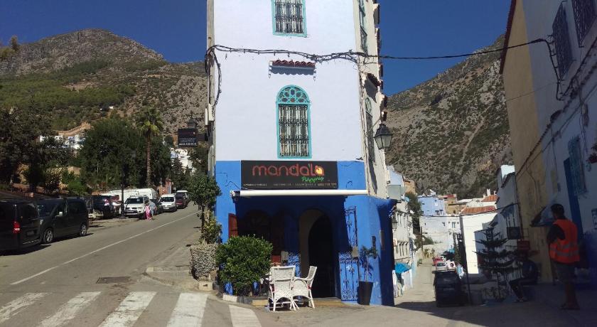 a building with a sign on the side of it, Hostal La Joya in Chefchaouen