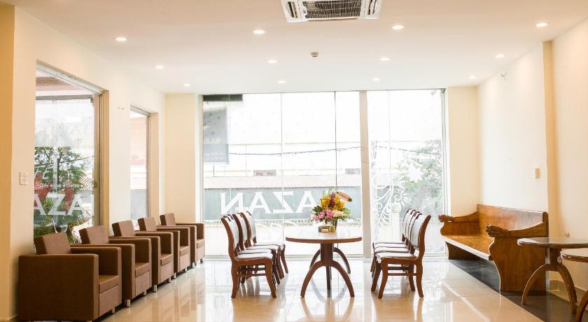 a living room filled with furniture and a table, Bazan Xanh in Buon Ma Thuot