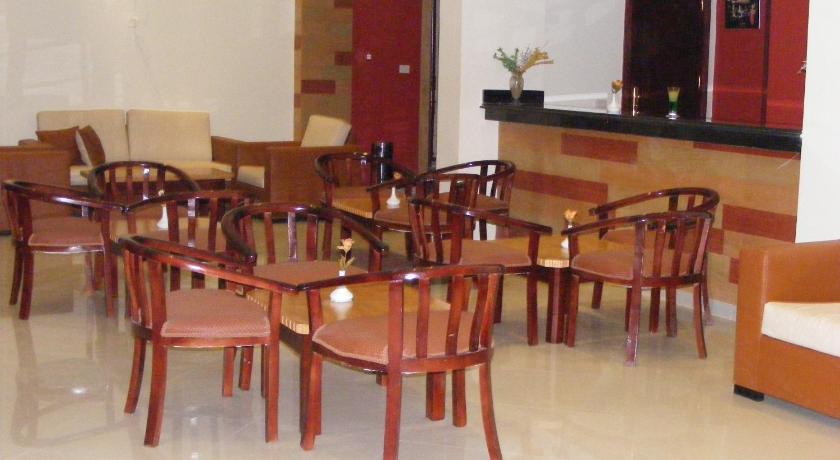 a dining room filled with tables and chairs, La Sirena Hotel & Resort - Families only in Ataqah