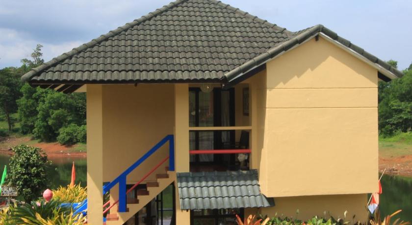 a house with a porch and a window, Porta Verde Resort Villas Caliraya in Laguna