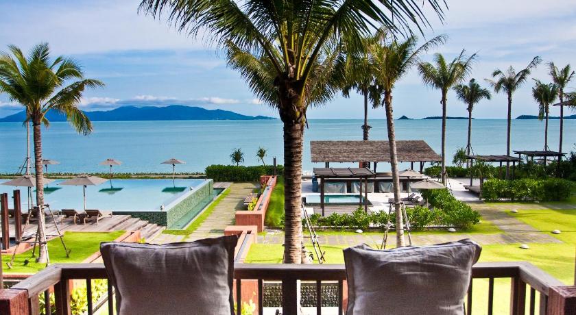 a beach with palm trees and palm trees, Hansar Samui Resort (SHA Extra Plus) in Koh Samui