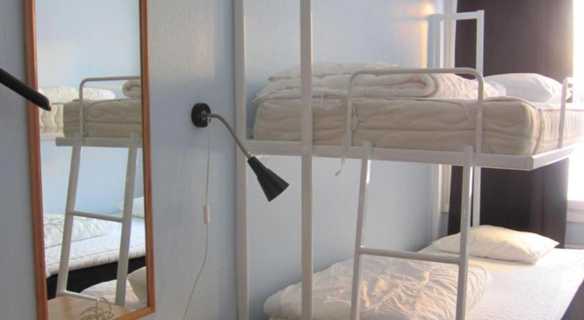 Image of Triple Room with Shared Bathroom 0