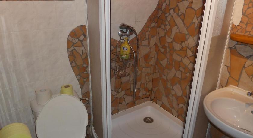 Image of Economy Quadruple Room with Shared Bathroom 16