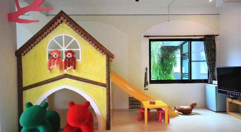 a living room filled with furniture and toys, Yudo B&B Yilan in Yilan